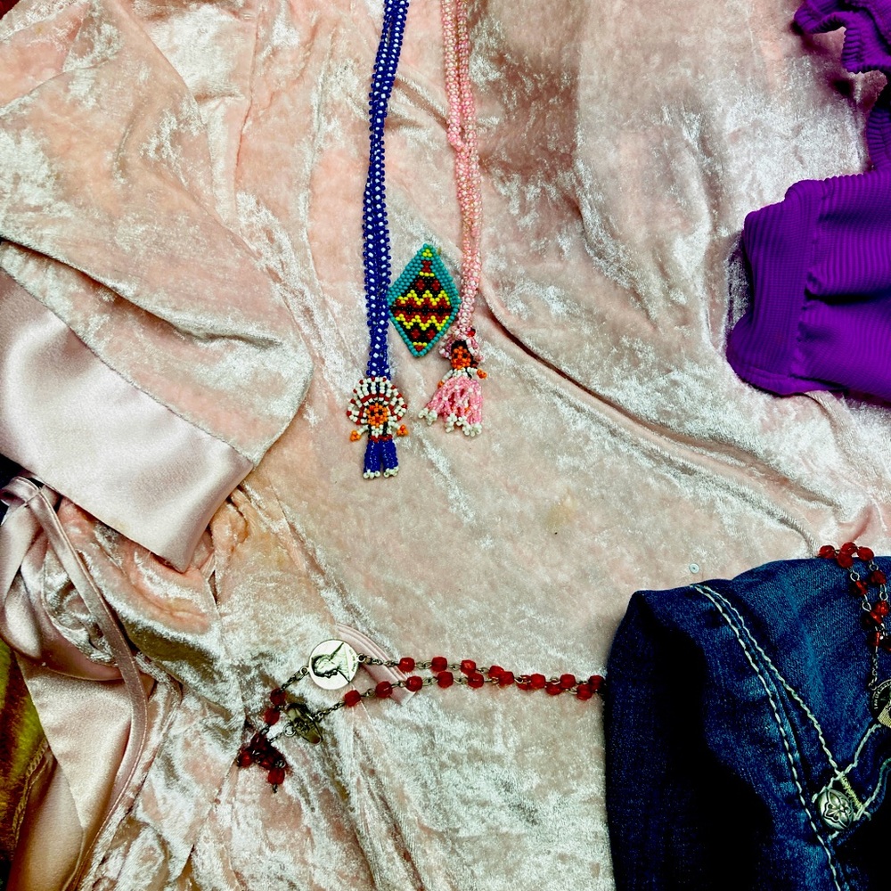 Hand beaded American Indian necklace one boy left and one girl only